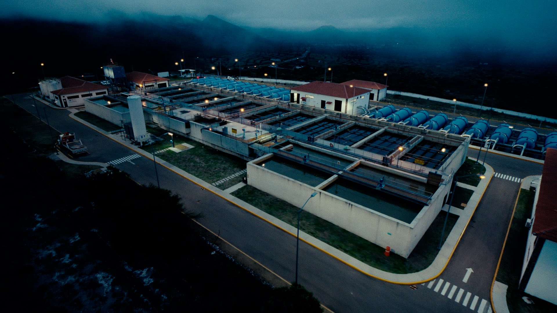 Water treatment plant at dusk, aerial view